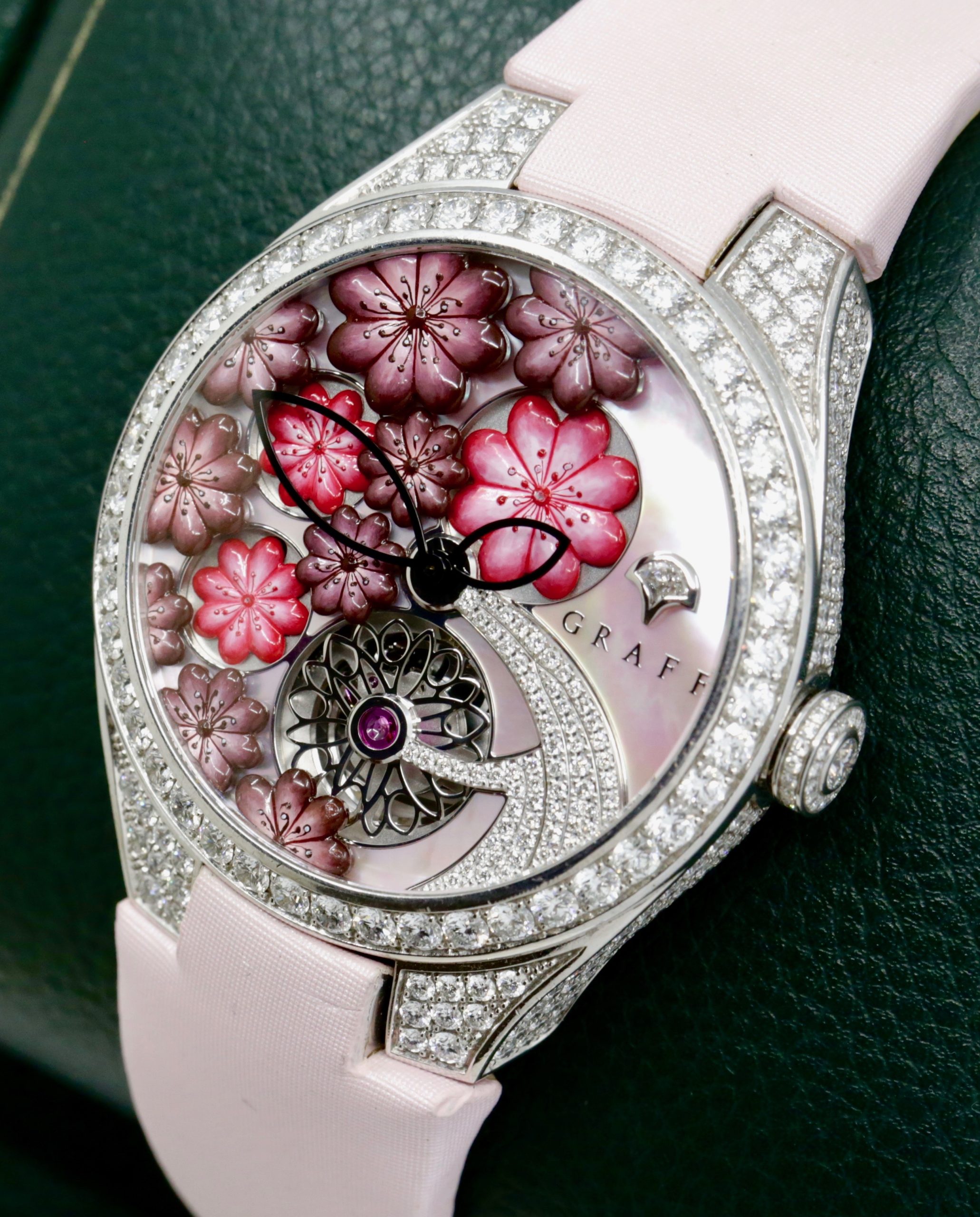 The Graff Floral Automatic Watch in 18ct White Gold, Set with Factory Diamonds on the Case, Lugs, Crown and Bezel, with Mother of Pearl Dial Set with a Floral Design and Diamonds, on a Graff Satin Band with Factory Diamond Set Tang Buckle. Ref: GFA37WGSLD, Box, Book, Additional Graff Satin Strap and Graff Warranty Card. - Image 5