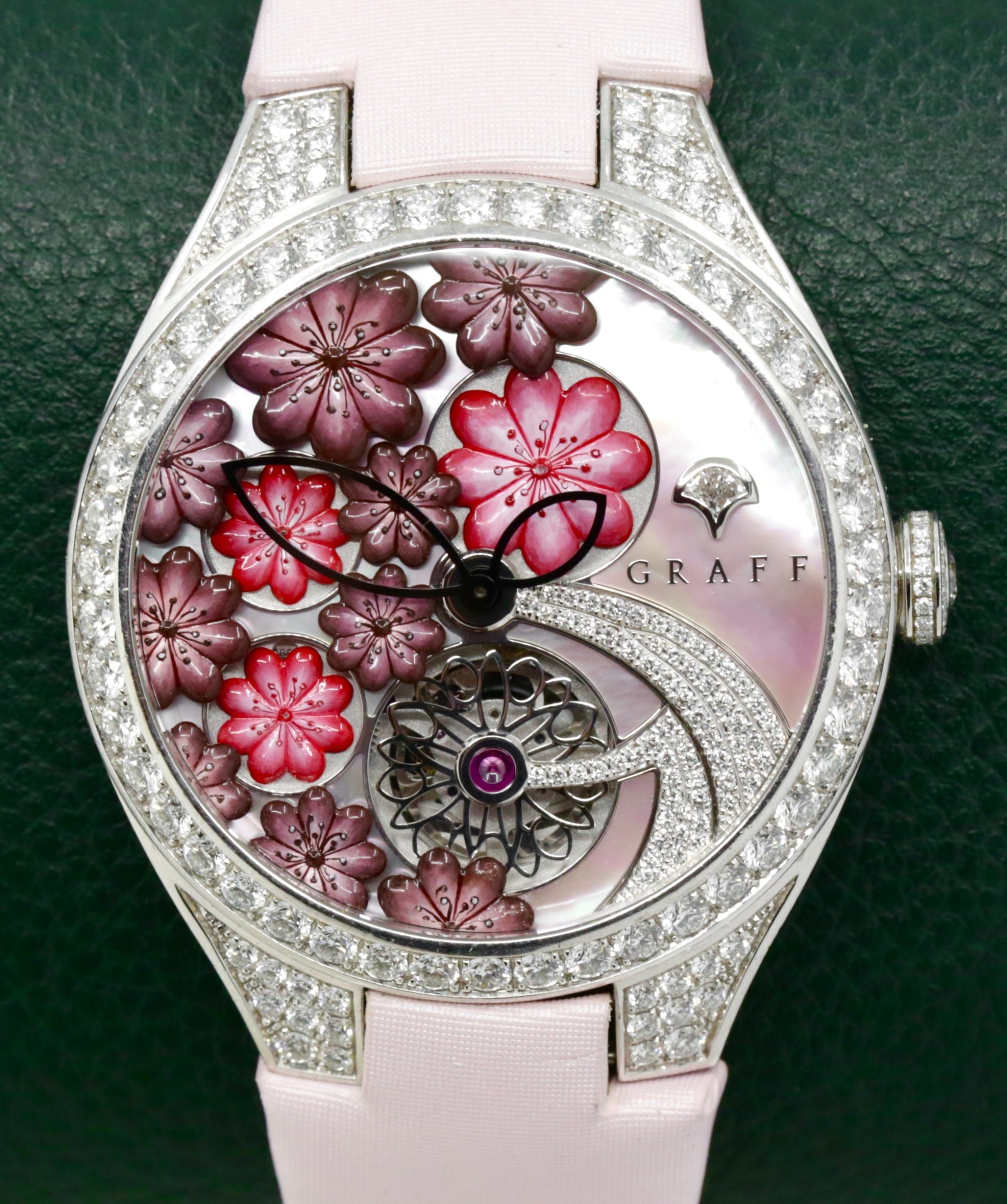 The Graff Floral Automatic Watch in 18ct White Gold, Set with Factory Diamonds on the Case, Lugs, Crown and Bezel, with Mother of Pearl Dial Set with a Floral Design and Diamonds, on a Graff Satin Band with Factory Diamond Set Tang Buckle. Ref: GFA37WGSLD, Box, Book, Additional Graff Satin Strap and Graff Warranty Card. - Image 3