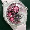 The Graff Floral Automatic Watch in 18ct White Gold, Set with Factory Diamonds on the Case, Lugs, Crown and Bezel, with Mother of Pearl Dial Set with a Floral Design and Diamonds, on a Graff Satin Band with Factory Diamond Set Tang Buckle. Ref: GFA37WGSLD, Box, Book, Additional Graff Satin Strap and Graff Warranty Card.