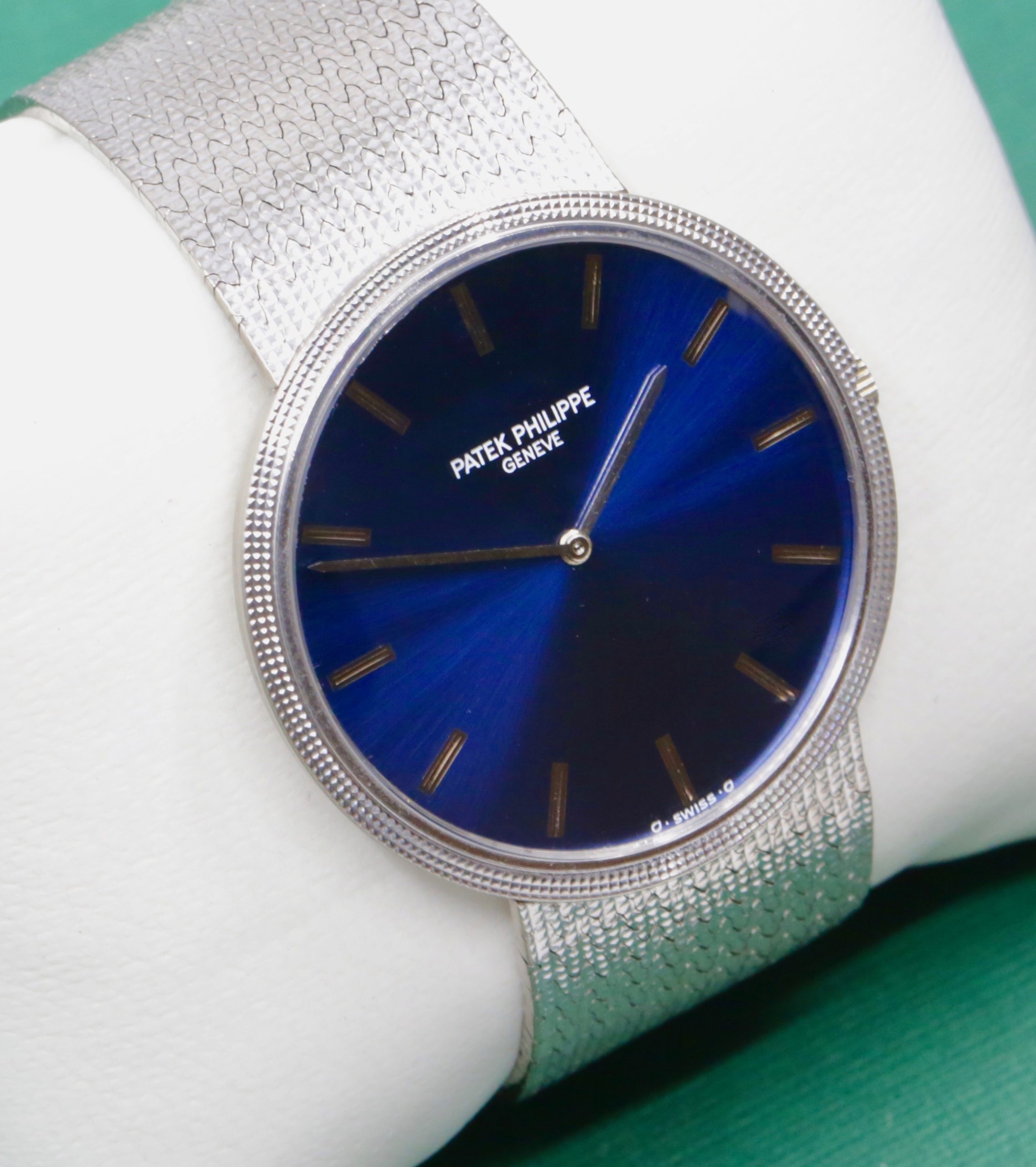 Vintage Patek Philippe Calatrava, in 18ct White Gold, Solid Gold Metallic Blue Dial with White Gold Index Markers, on 18ct White Gold Patek Philippe Integrated Bracelet, Ref. 3588/1, Circa: 1973, with Patek Philippe Extract from Archives Certificate