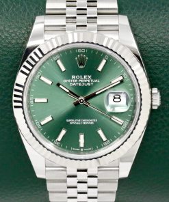 Rolex Datejust 41, Stainless Steel, 18ct White Gold Fluted Bezel, Mint Green Index Dial, on Stainless Steel Rolex Jubilee Bracelet, Ref. 126334, Circa: 2023, with Box, Books, Rolex Warranty Card & Balance of 5 Year Rolex Factory Warranty