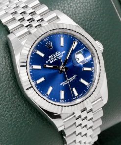 Rolex Datejust 41, Stainless Steel, 18ct White Gold Fluted Bezel, Blue Index Dial, on Stainless Steel Rolex Jubilee Bracelet, Ref. 126334, Circa: 2022, with Box, Books, Rolex Warranty Card & Balance of 5 Year Rolex Factory Warranty