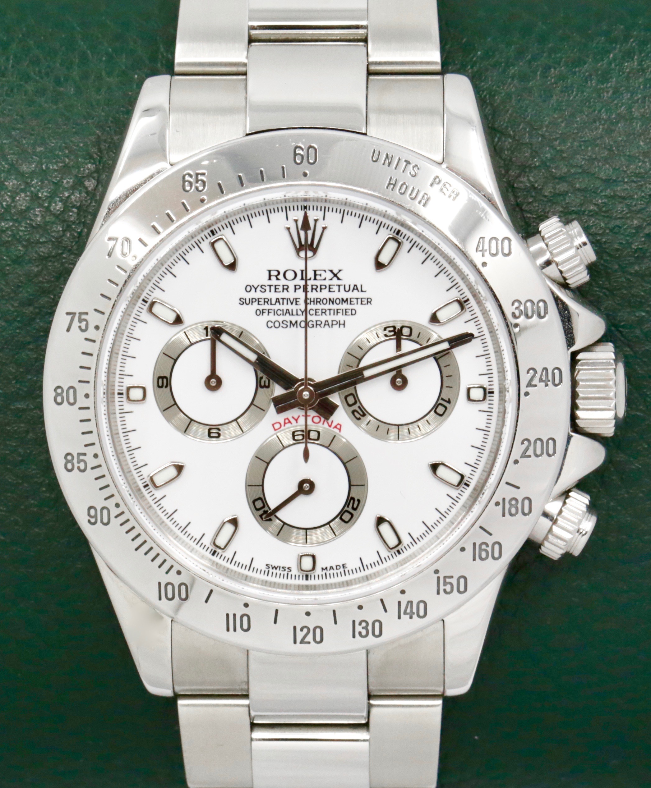 Rolex Cosmograph Daytona, Stainless Steel Case, with Stainless Steel Bezel, White Index Dial, on Stainless Steel Rolex Oyster Bracelet, Ref. 116520, Circa: 2004, with Box, Book, Rolex Service Card & Balance of 2 Year Rolex Service Warranty