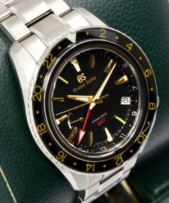 Grand Seiko Spring Drive GMT, 44mm, made of High Intensity Titanium, Black Index Dial, Black Ceramic Bezel, on Grand Seiko High Intensity Titanium Bracelet, Ref. SBGE215G,  Circa: 2022, Complete with Box, Papers & Balance of 5 Year Grand Seiko Factory Warranty