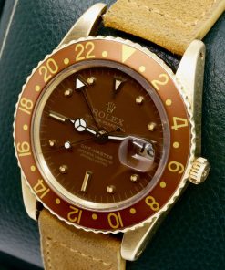 Alternative view of RARE!! Rolex GMT Master, in 18ct Yellow Gold, No Crown Guard Case, Brown Aluminium Bezel, Brown Nipple Dial, on Suede Strap with Yellow Gold Rolex Tang Buckle, Ref. 1675, Circa: 1965, with Rolex Box & Rolex Service Invoice