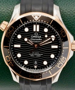 Omega Seamaster Diver 300M, 42mm, Stainless Steel & 18ct Sedna™ Gold, Black Wave Index Dial, on Black Omega Rubber Strap with Stainless Steel Omega Tang Buckle, Ref. 210.22.42.20.01.002, Circa: 2022, Complete with Box, Books, Omega Warranty Cards & Balance of 5 Year Omega Factory Warranty