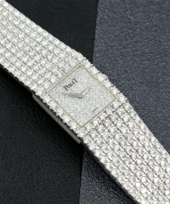 Piaget Mecanique ultra-thin ladies 18ct white gold watch with fully integrated factory set pavé-set diamond bracelet, diamond dial and matching clasp, est. 9.30 carats, VS clarity diamonds. Ref: 4154 N, Circa: 1990’s