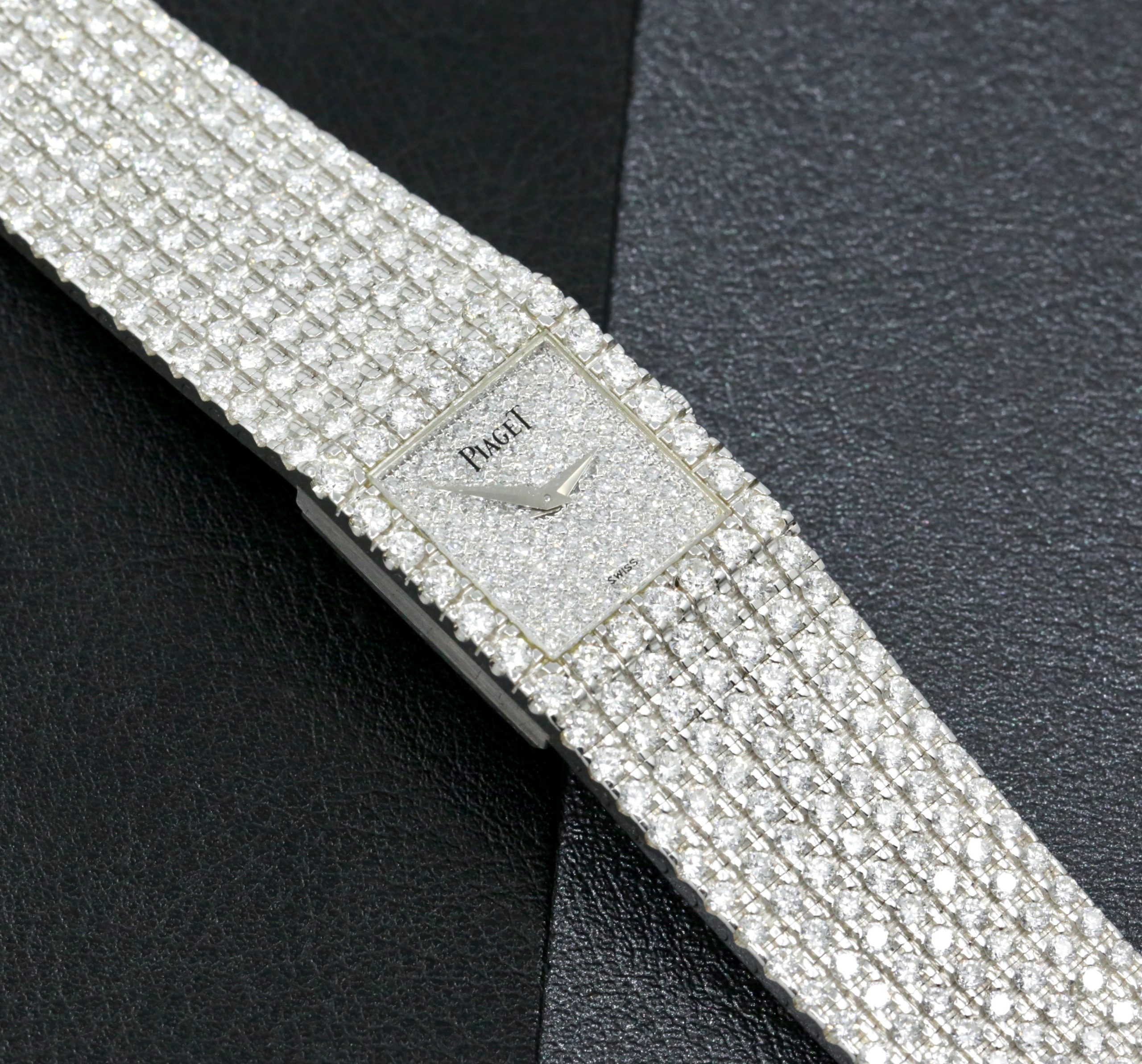 Piaget Mecanique ultra-thin ladies 18ct white gold watch with fully integrated factory set pavé-set diamond bracelet, diamond dial and matching clasp, est. 9.30 carats, VS clarity diamonds. Ref: 4154 N, Circa: 1990’s