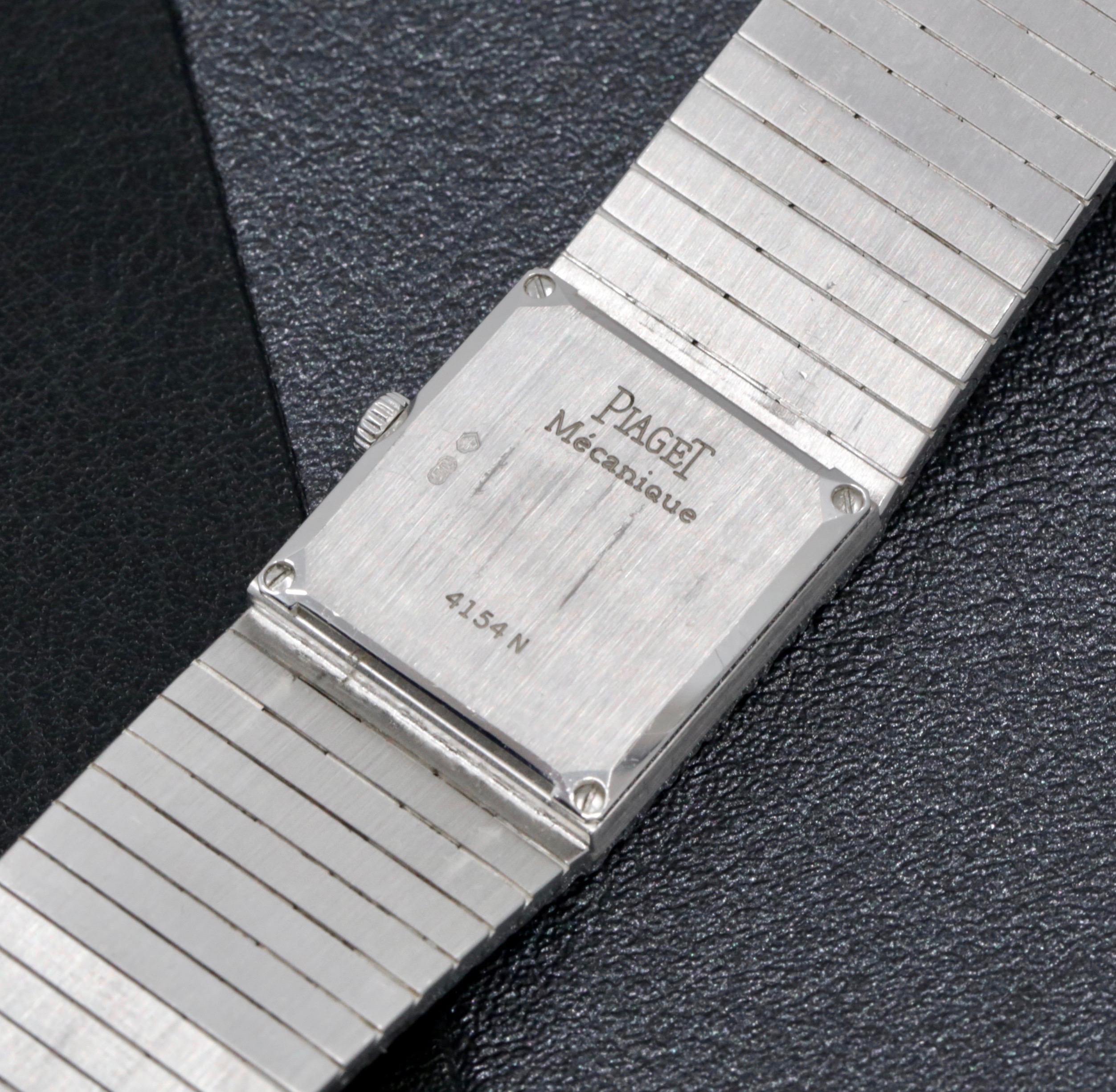Piaget Mecanique ultra-thin ladies 18ct white gold watch with fully integrated factory set pavé-set diamond bracelet, diamond dial and matching clasp, est. 9.30 carats, VS clarity diamonds. Ref: 4154 N, Circa: 1990’s - Image 5