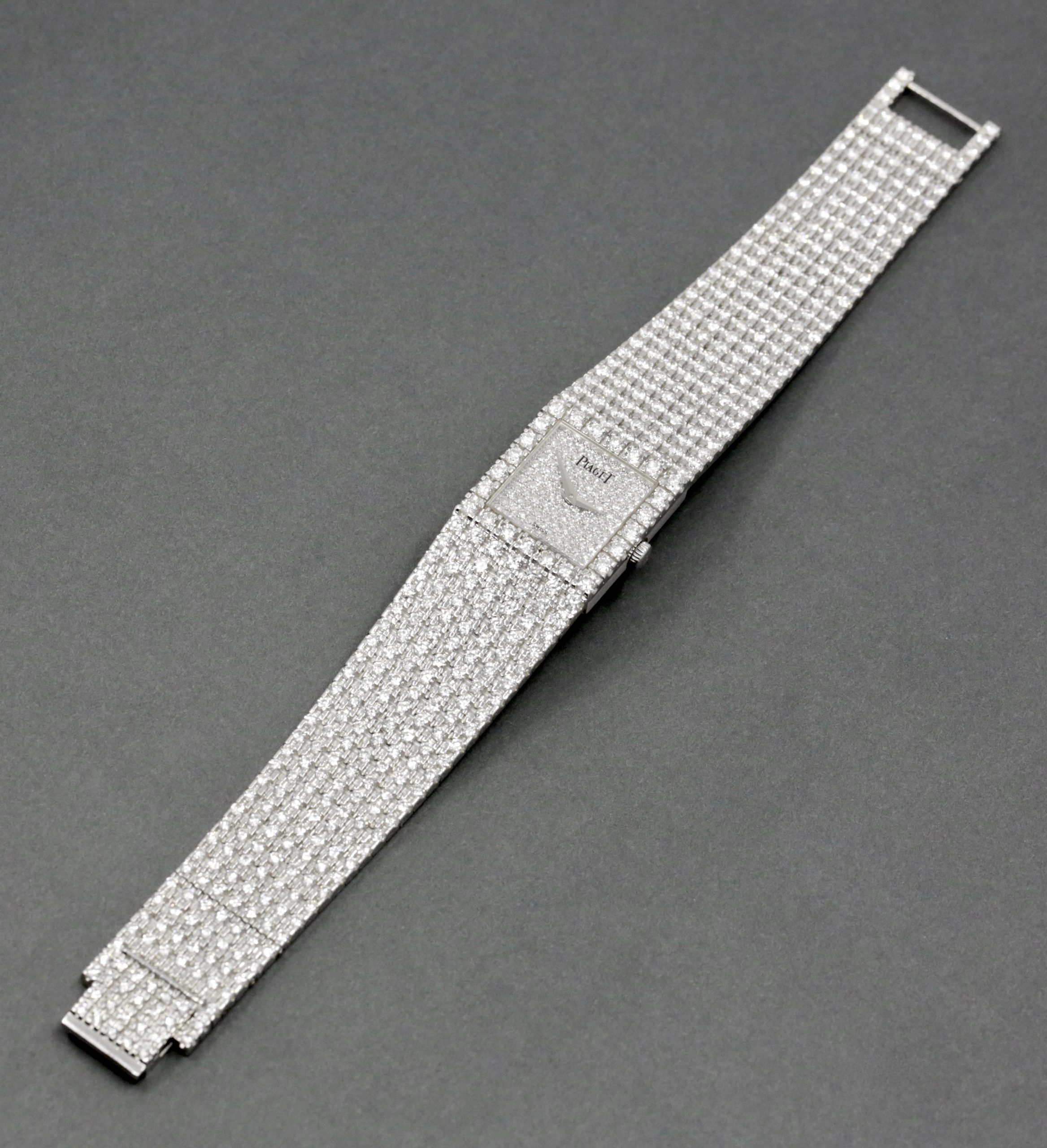 Piaget Mecanique ultra-thin ladies 18ct white gold watch with fully integrated factory set pavé-set diamond bracelet, diamond dial and matching clasp, est. 9.30 carats, VS clarity diamonds. Ref: 4154 N, Circa: 1990’s - Image 7
