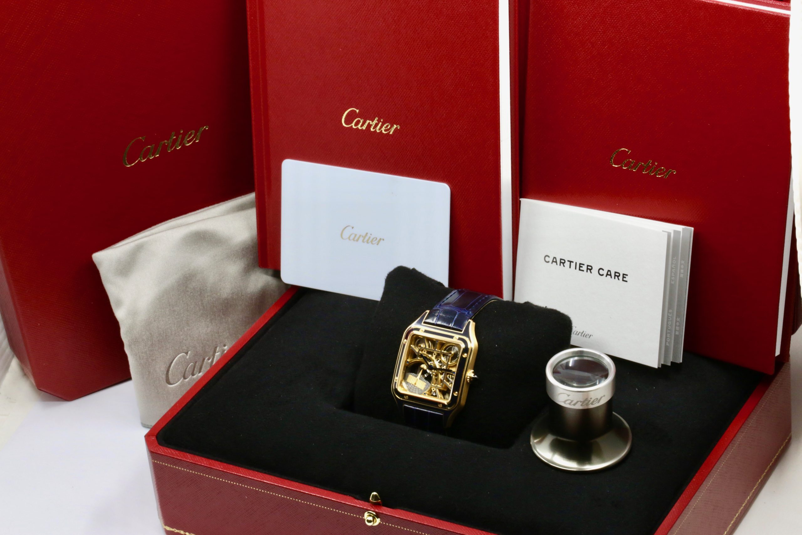 Cartier Santos Dumont Skeleton Watch with Micro-Rotor, in 18ct Yellow Gold with Navy Blue Enamelling, on Navy Blue Cartier Alligator Strap with 18ct Yellow Gold Cartier Tang Buckle, Ref. WHSA0031, Circa: 2024, with Box, Papers & Balance of 8 Year extended Cartier Factory Warranty. "This model is Limited to 150 pieces" - Image 7