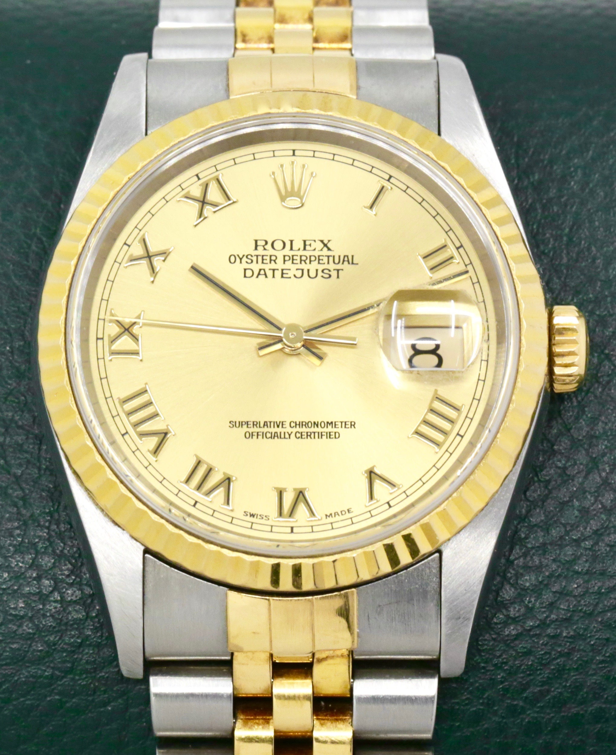 Rolex Datejust 36, Stainless Steel & 18ct Yellow Gold, Fluted Dial, Champagne Roman Dial, on Stainless Steel & 18ct Yellow Gold Rolex Jubilee Bracelet, Ref. 16233, Circa: 2002, Box & Papers
