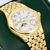 Patek Philippe Neptune in 18ct yellow gold, White Arab dial on a Patek Philippe 18ct yellow gold integrated bracelet. Ref. 5085J