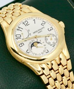 Patek Philippe Neptune in 18ct yellow gold, White Arab dial on a Patek Philippe 18ct yellow gold integrated bracelet. Ref. 5085J