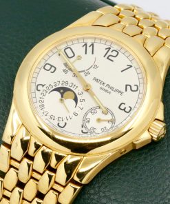 Alternative view of Patek Philippe Neptune in 18ct yellow gold, White Arab dial on a Patek Philippe 18ct yellow gold integrated bracelet. Ref. 5085J