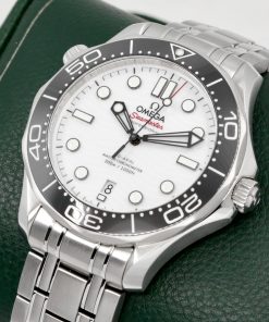Alternative view of Omega Seamaster Diver 300M in Stainless Steel, Black Ceramic Bezel, White Index Dial, on Stainless Steel Omega Bracelet, Ref. 210.32.42.20.04.001, Circa: 2020, with Box, Book & Omega Warranty Cards.