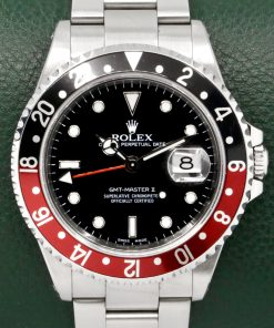 Rolex GMT-Master II "Coke", Stainless Steel, Black Index Dial, with Black & Red Aluminium Bezel, on Stainless Steel Rolex Oyster Bracelet, Ref. 16710, Circa: 2002, Complete with Box, Books, Swing Tag, Rolex Warranty Certificate & Balance of 2 Year Rolex Service Warranty