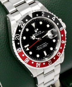 Alternative view of Rolex GMT-Master II "Coke", Stainless Steel, Black Index Dial, with Black & Red Aluminium Bezel, on Stainless Steel Rolex Oyster Bracelet, Ref. 16710, Circa: 2002, Complete with Box, Books, Swing Tag, Rolex Warranty Certificate & Balance of 2 Year Rolex Service Warranty