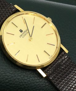 Universal Geneve Dress watch in 18ct Yellow gold, champagne index dial on a leather strap. Ref: 142100,  Circa 1960's "Watch only"