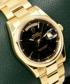 Alternative view of Rolex Day-Date, in 18ct Yellow Gold, Black Index Dial, with the Rare Domed Bezel, on 18ct Yellow Gold Rolex Oyster Bracelet, Ref. 118208, Circa: 2004, with Rolex Box, Books, Rolex Folder, Rolex Warranty Certificate, Rolex Service Invoice & Balance of 2 Year Rolex Service Warranty