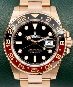 Rolex GMT-Master II, in 18ct Everose Gold, Black Index Dial, with Black & Brown Ceramic Bezel, on a Rolex 18ct Everose Gold Rolex Oyster Bracelet, Ref. 126715CHNR, Circa: 2021, with Box, Books, Rolex Warranty Card & Balance of 5 Year Rolex Factory Warranty *MINT CONDITION!!!