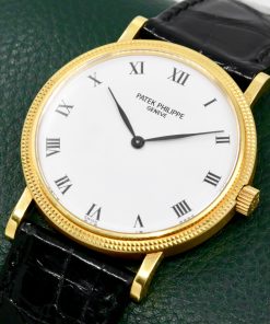 Alternative view of Patek Philippe Calatrava, Ref.3992J, Automatic, (0.750) 18ct Yellow Gold, Hobnail Bezel, White Acrylic Enamel Dial, on Black Patek Philippe Leather Strap with 18ct Yellow Gold Patek Tang Buckle