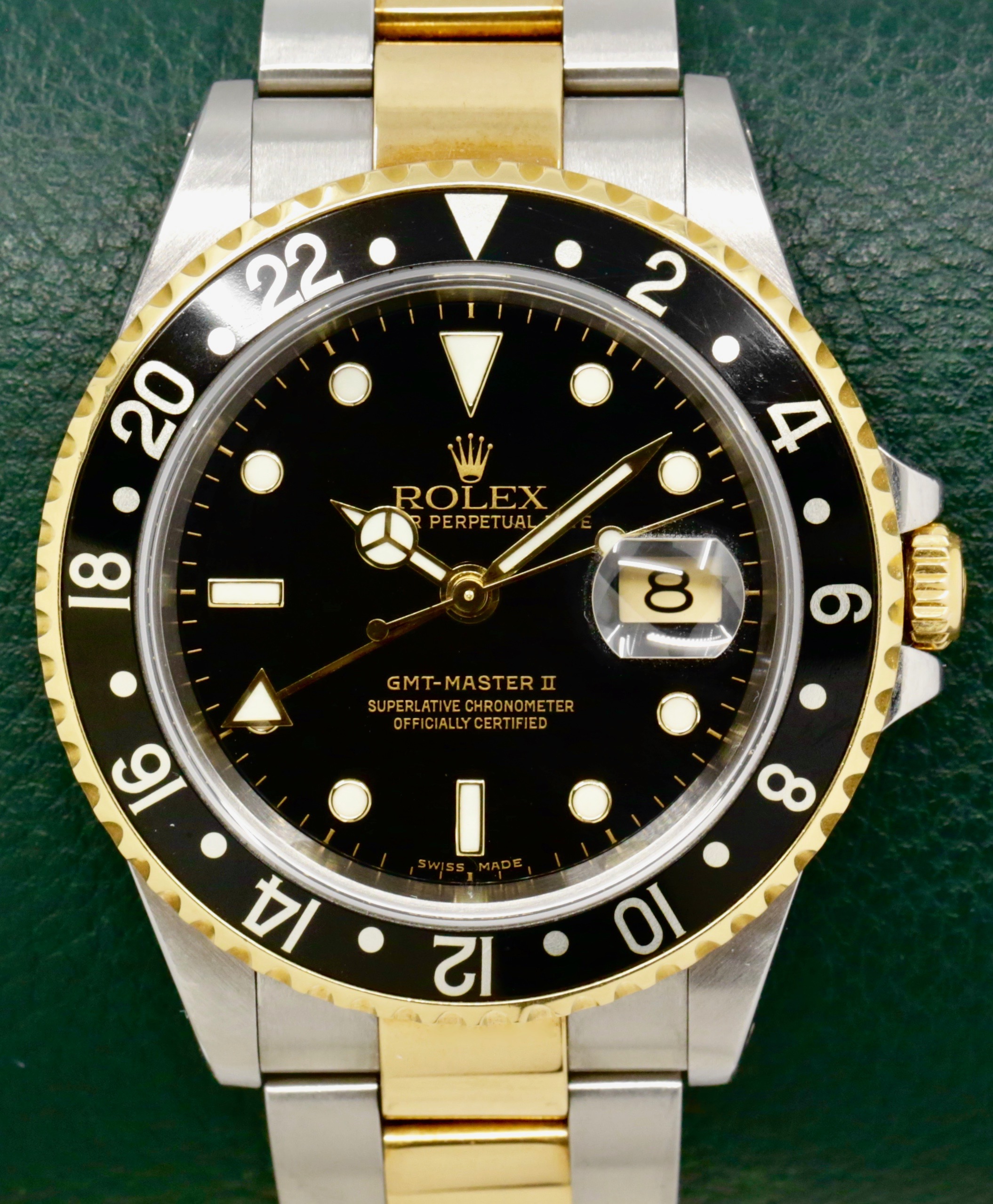 Rolex GMT-Master II in Stainless Steel & 18ct Yellow Gold, Black Index Dial, Black Aluminium Bezel, on Stainless Steel & 18ct Yellow Gold Bracelet, Ref. 16713, Circa: 2004, with Box, Books, Swing Tags & Rolex Warranty Certificate