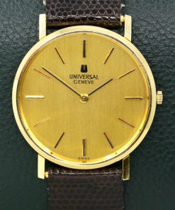 Universal Geneve 18k 0.750 yellow gold dress watch, manual winding, original dial-winding crown-strap-buckle & swing tags, Ca 1980.