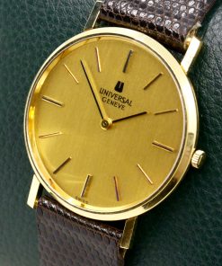 Alternative view of Universal Geneve 18k 0.750 yellow gold dress watch, manual winding, original dial-winding crown-strap-buckle & swing tags, Ca 1980.