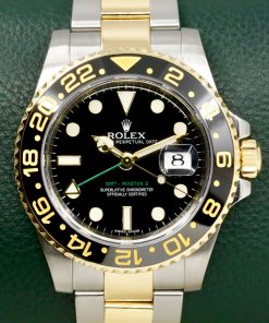 Rolex GMT-Master II, Stainless Steel & 18ct Yellow Gold, Black Ceramic, Black Index Dial, on Stainless Steel & 18ct Yellow Gold Rolex Oyster Bracelet, Ref. 116713LN, Circa: 2011, with Box, Books, Rolex Warranty Card & Rolex Service Card