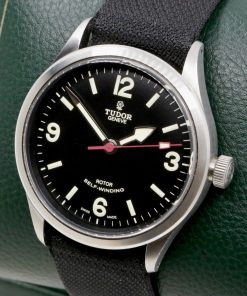 Alternative view of Tudor Heritage Ranger in Stainless Steel, 41mm, Matte Black Dial with Luminous Arabic Numerals at 3,6,9,12 Dial with Harpoon Hands on a Tudor Fabric Strap and Tang Buckle, Ref. 79910, Circa: 2017, with Box, Book and Tudor Warranty Card