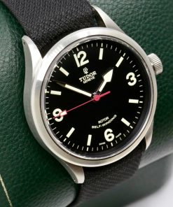 Tudor Heritage Ranger in Stainless Steel, 41mm, Matte Black Dial with Luminous Arabic Numerals at 3,6,9,12 Dial with Harpoon Hands on a Tudor Fabric Strap and Tang Buckle, Ref. 79910, Circa: 2017, with Box, Book and Tudor Warranty Card