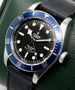 Alternative view of Tudor Heritage Black Bay "Smiley", 41mm Stainless Steel Case, Black Index Dial, Blue Aluminium Bezel, on Black Tudor Leather Strap with Stainless Steel Tudor Deployant, Ref. 79220B, Circa: 2014, Complete with Box, Books, Tudor Warranty Card & Tudor Service Card