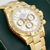 Rolex Cosmograph Daytona, Zenith Movement, in 18ct Yellow Gold, White Index Dial, on 18ct Yellow Gold Rolex Oyster Bracelet, Ref. 16528, Circa: 1995, with Rolex Service Invoice, Rolex Service Card & Balance of 2 Year Rolex Service Warranty