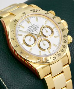 Rolex Cosmograph Daytona, Zenith Movement, in 18ct Yellow Gold, White Index Dial, on 18ct Yellow Gold Rolex Oyster Bracelet, Ref. 16528, Circa: 1995, with Rolex Service Invoice, Rolex Service Card & Balance of 2 Year Rolex Service Warranty