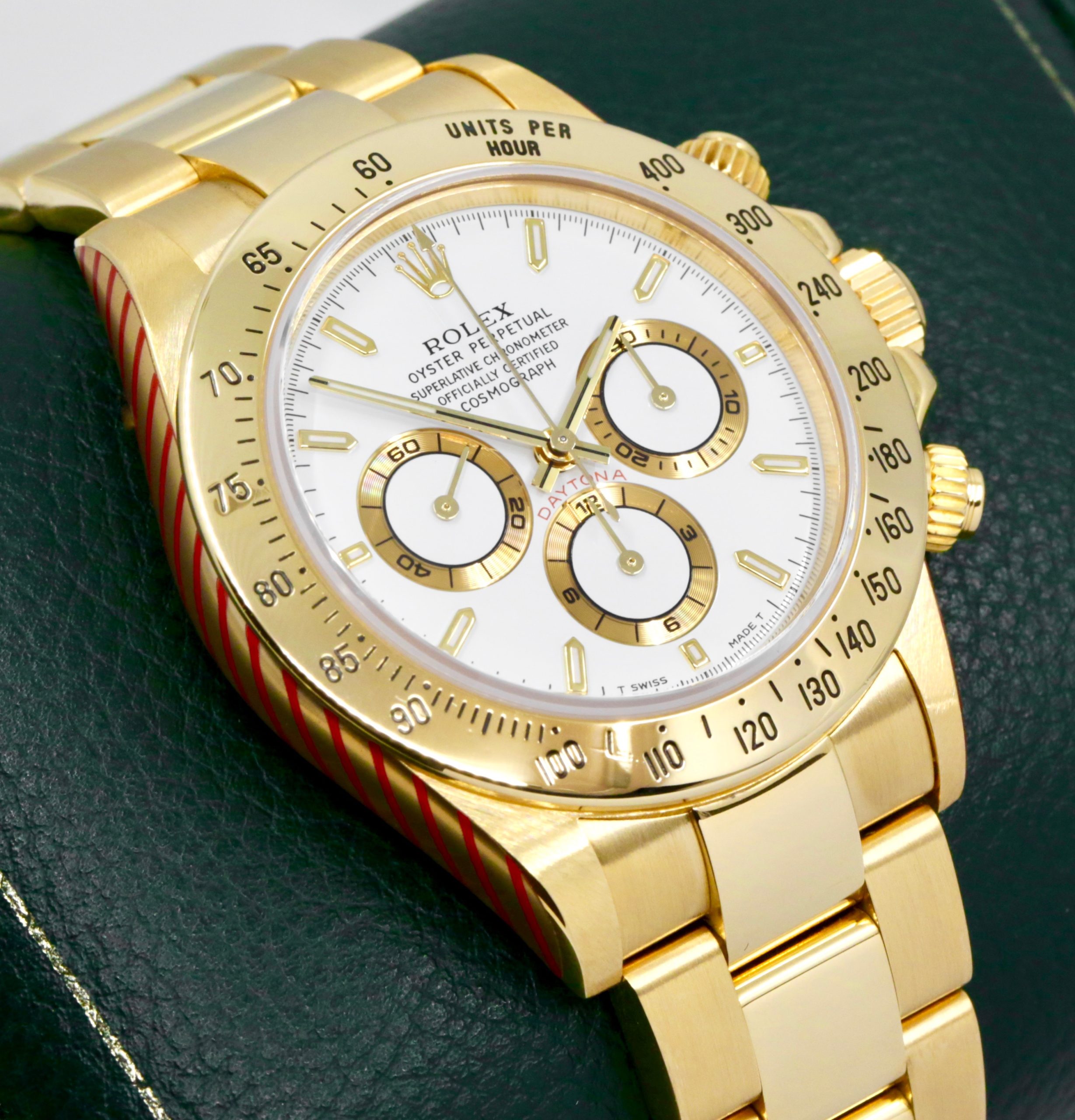 Rolex Cosmograph Daytona, Zenith Movement, in 18ct Yellow Gold, White Index Dial, on 18ct Yellow Gold Rolex Oyster Bracelet, Ref. 16528, Circa: 1995, with Rolex Service Invoice, Rolex Service Card & Balance of 2 Year Rolex Service Warranty