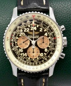 Breitling Navitimer Cosmonaute 24HR in stainless steel, slide rule bezel, Black Arabic dial with the Rare Tropical sub-dials, on a Breitling strap and tang buckle. Ref: A12020, Circa 1990's