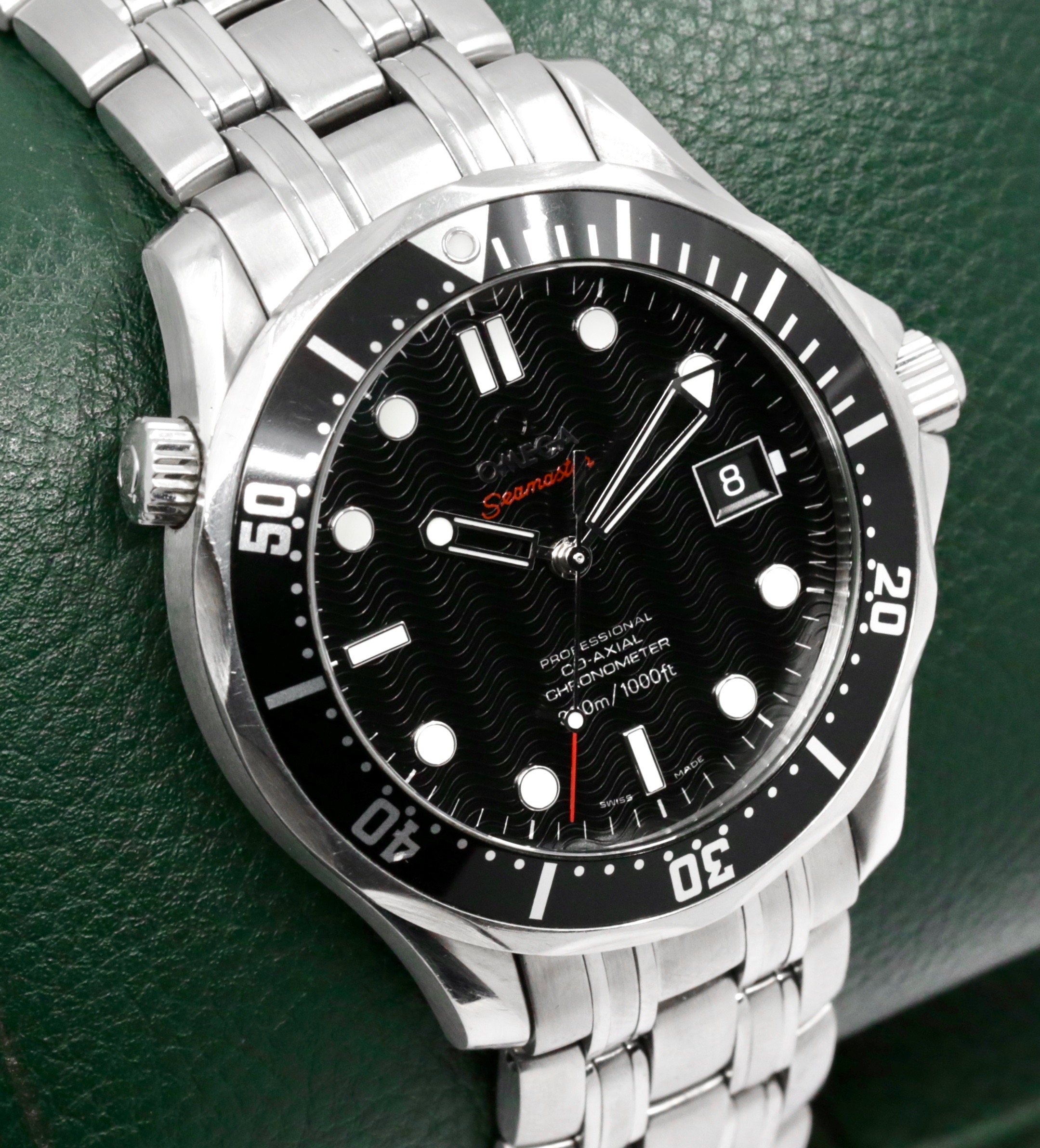 Omega Seamaster 300 in stainless steel, black index laser-engraved wave motif dial with a black 60 minute bezel on an Omega stainless steel bracelet Ref 212.30.41.20.01.002, Watch Only Ca 2012 (est) - Image 2