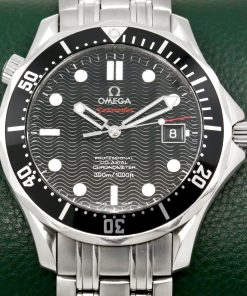 Omega Seamaster 300 in stainless steel, black index laser-engraved wave motif dial with a black 60 minute bezel on an Omega stainless steel bracelet Ref 212.30.41.20.01.002, Watch Only Ca 2012 (est)