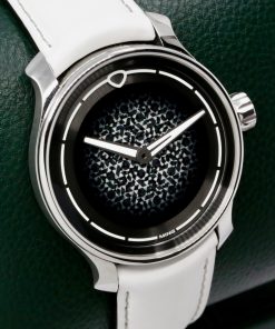 Alternative view of Ming 37.07 is a 38mm stainless steel, manual-wind watch. “ Ming’s Mosaic for All” dial. Released in 2022 for Ming’s 5th anniversary. On a Ming white rubber strap & "tuck-under" tang buckle. Ref# 37.07, with Box, Ming Warranty Paper. Circa 2025.