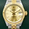 Rolex Lady-Datejust 28, Stainless Steel & 18ct Yellow Gold, Fluted Bezel, Champagne Index Dial, on Stainless Steel & 18ct Yellow Gold Rolex Jubilee Bracelet, Ref. 279173, Circa: 2021, with Box, Book and Rolex Warranty Card