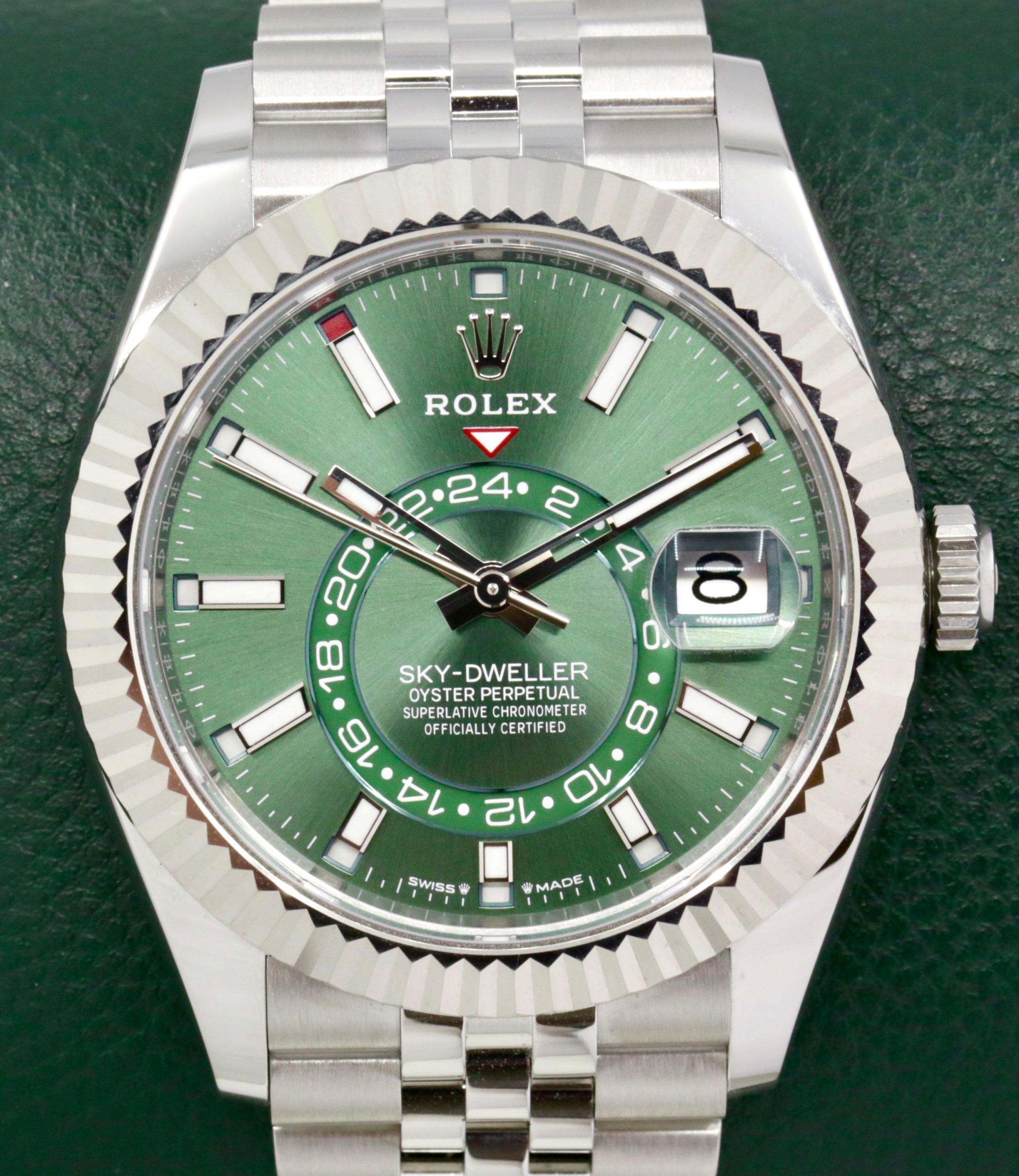 Rolex Sky-Dweller, in Stainless Steel, 18ct White Gold Fluted Bezel, Mint Green Index Dial, on Stainless Steel Rolex Jubilee Bracelet, Ref 336934, Late 2024 Model, with Box, Books, Swing Tag, Rolex Warranty Card & Balance of 5 Year Rolex Factory Warranty