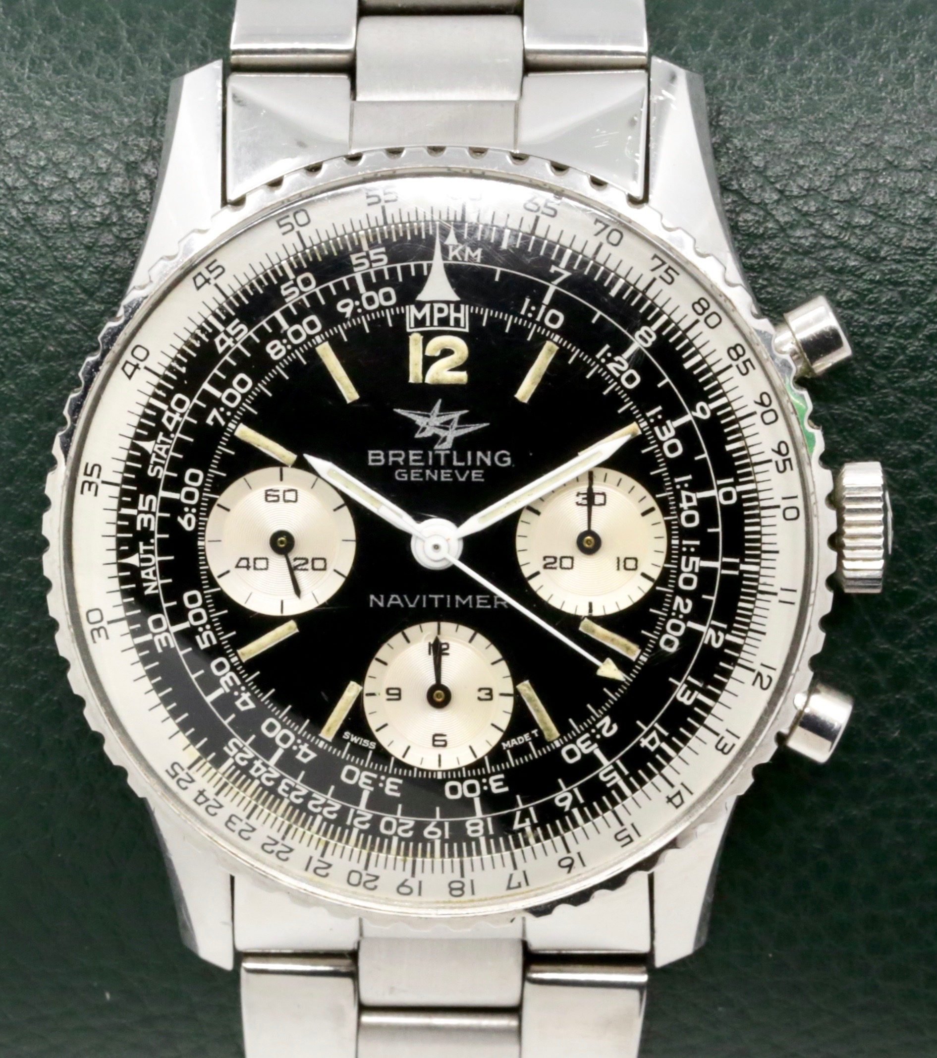 Breitling Navitimer chronograph Ref 806, in Stainless Steel, Original Gloss Black Gilt Dial with Twin Jet Logo on a Breitling Stainless Steel bracelet, Totally Original with Original Bracelet, Box and Booklet, Circa: 1965.