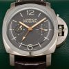 Panerai Luminor 1950 Tourbillon GMT “Titanio” in Titanium, Brown Index Dial with GMT Hand, Power Reserve & AM/PM Indicators, Limited to 150 Pieces. Reference: PAM 00306, Circa: 2009, with Box, Books, Papers & Panerai Certificate