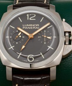 Panerai Luminor 1950 Tourbillon GMT “Titanio” in Titanium, Brown Index Dial with GMT Hand, Power Reserve & AM/PM Indicators, Limited to 150 Pieces. Reference: PAM 00306, Circa: 2009, with Box, Books, Papers & Panerai Certificate