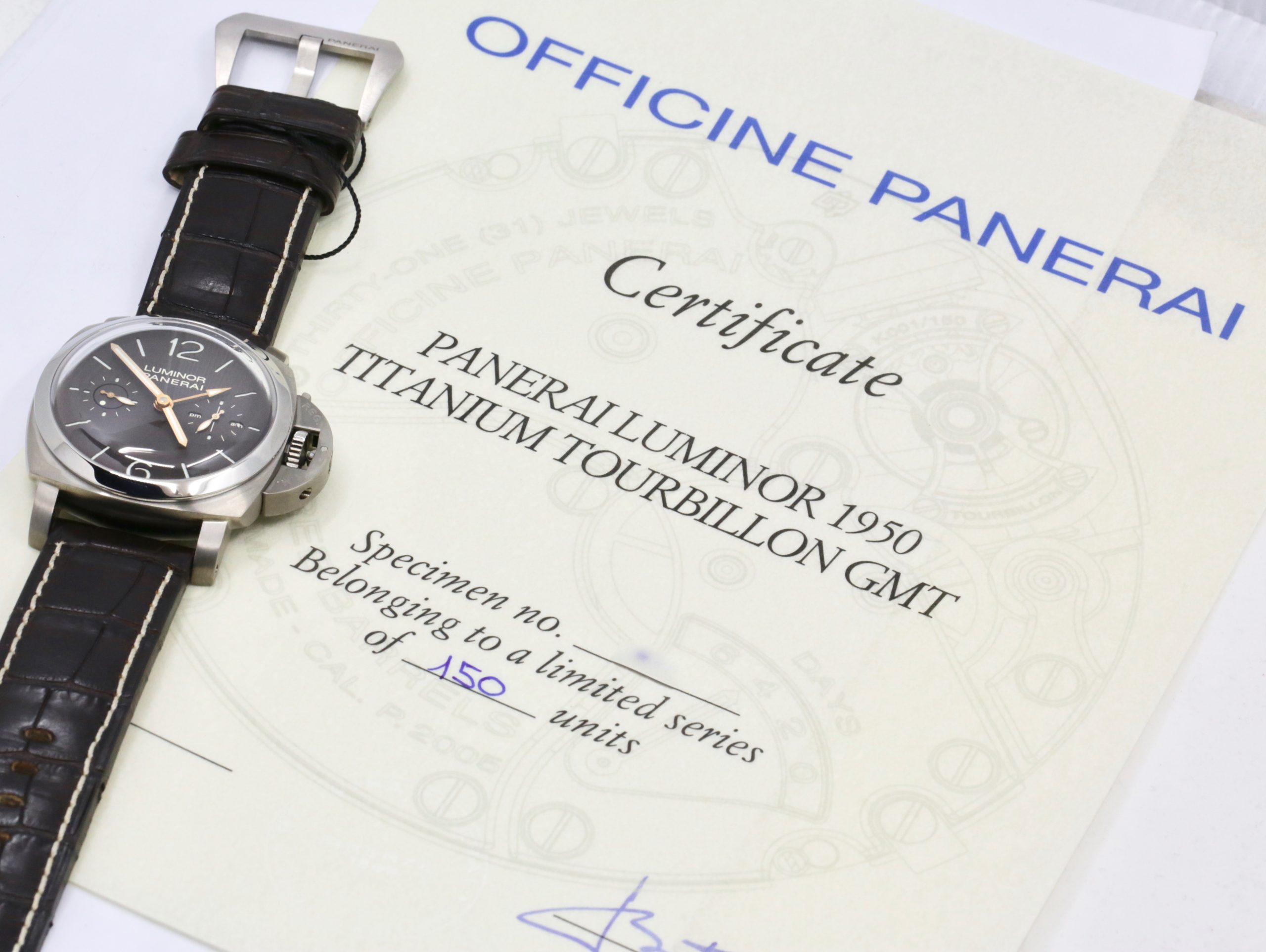 Panerai Luminor 1950 Tourbillon GMT “Titanio” in Titanium, Brown Index Dial with GMT Hand, Power Reserve & AM/PM Indicators, Limited to 150 Pieces. Reference: PAM 00306, Circa: 2009, with Box, Books, Papers & Panerai Certificate - Image 8