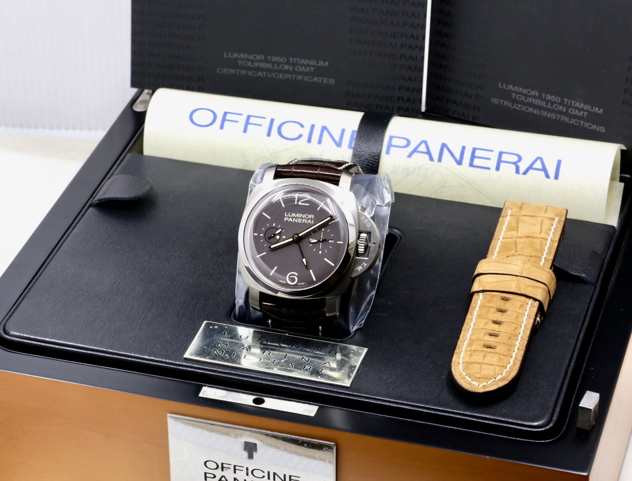 Panerai Luminor 1950 Tourbillon GMT “Titanio” in Titanium, Brown Index Dial with GMT Hand, Power Reserve & AM/PM Indicators, Limited to 150 Pieces. Reference: PAM 00306, Circa: 2009, with Box, Books, Papers & Panerai Certificate - Image 9