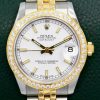 Rolex Lady-Datejust 31, Stainless Steel & 18ct Yellow Gold, Factory Set Diamond Bezel, White Index Dial, on Stainless Steel & 18ct Yellow Gold Rolex Jubilee Bracelet, Ref. 178383, Circa: 2011, with Box, Books, Rolex Warranty Card, Rolex Service Cards & Balance of 2 Year Rolex Service Warranty