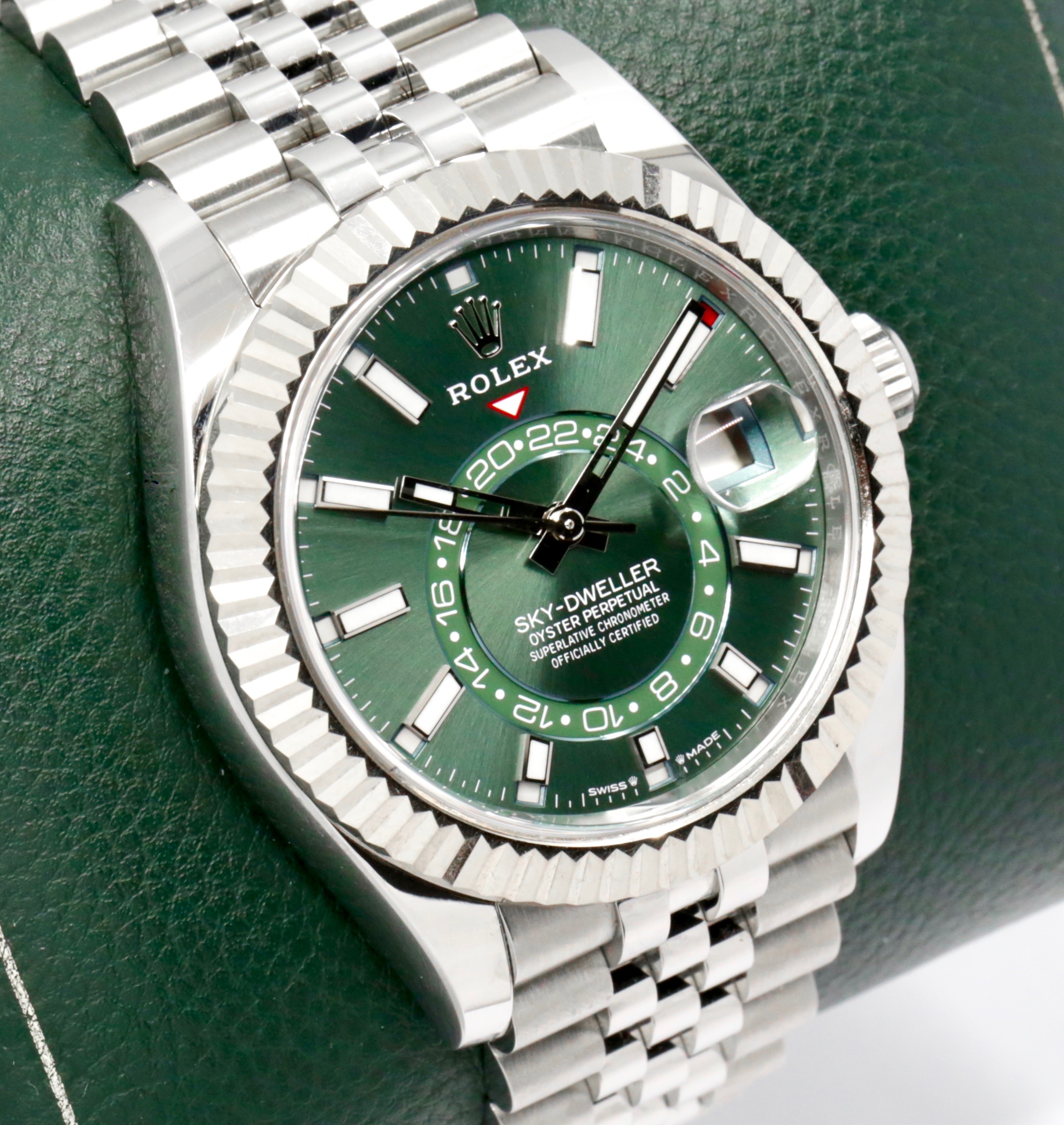 Rolex Sky-Dweller, Mint Green Index Dial, 42mm Stainless Steel Case with 18ct White Gold Fluted Bezel, on Stainless Steel Rolex Jubilee Bracelet, Ref. 336934, Circa: 2024, with Complete with Box, Books, Green & White Swing Tags, Rolex Warranty Card & Balance of 5 Year Rolex Factory Warranty