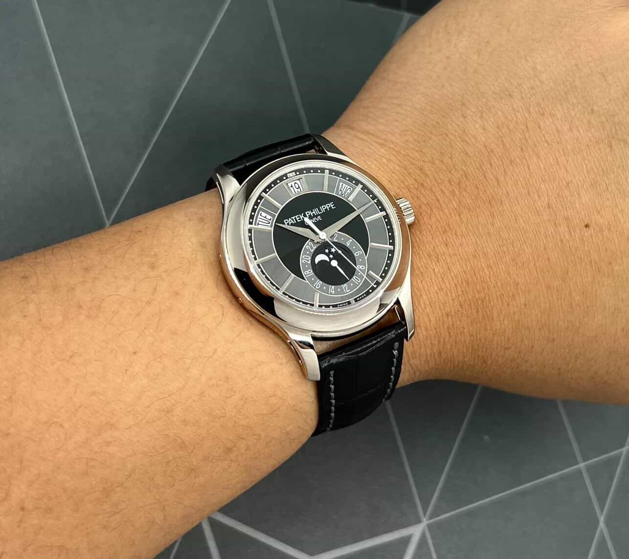 Patek Philippe Ref. 5205G-010 Annual Calendar, in 18ct White Gold, with Grey & Black Index Dial, Day, Date, Month, & Moon Phase Display, on Black Patek Philippe Alligator Strap with 18ct White Gold Patek Philippe Tang Buckle, Sold New in 2012, with Box & Papers - Image 10